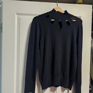 Black high neck sweater with necklace cutouts